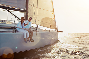 Image showing Relax, travel and luxury with couple on yacht for summer, love and sunset on Rome vacation trip. Adventure, journey and vip with man and woman sailing on boat for ocean, tropical and honeymoon at sea