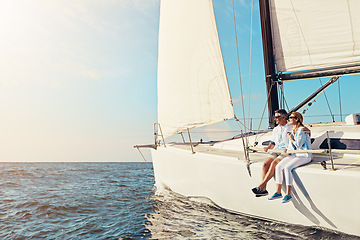 Image showing Relax, travel and luxury with couple on yacht for summer, love and sunset on Rome vacation trip. Adventure, journey and vip with man and woman sailing on boat for ocean, tropical and mockup at sea