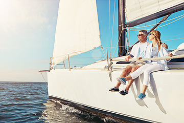 Image showing Relax, travel and luxury with couple on yacht for summer, love and sunset on Rome vacation trip. Adventure, journey and ship with man and woman sailing on boat for ocean and tropical honeymoon at sea