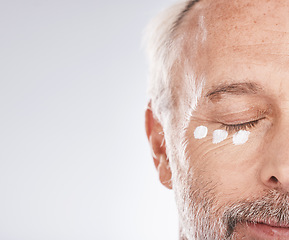 Image showing Skincare, cream and face of senior man on white background for beauty, wellness and dermatology. Cosmetics, grooming and elderly male with anti aging beauty products, facial treatment and lotion