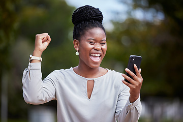 Image showing Happy black woman, phone and winner for good news, promotion or business opportunity in the outdoors. African American woman with smile in excitement for bonus, achievement or victory on smartphone