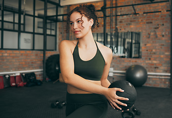 Image showing Fitness, medicine ball and exercise of a woman at gym doing weight training for body wellness, health and energy. Sports female with equipment for strong muscle power, balance and healthy lifestyle