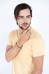 Image showing Idea, studio and young man thinking, pensive and focus on contemplating problem solving plan. Question, doubt and puzzled model think of solution, decision or choice isolated on white background wall