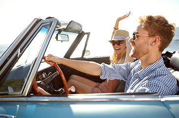 Image showing Car road trip, travel and fun couple on bonding holiday adventure, transportation journey or outdoor summer vacation. Love flare, convertible vehicle and driver driving on Australia countryside tour