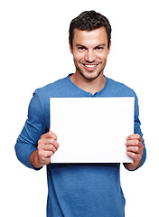 Image showing Man, blank sign and portrait of a model with advertisement, marketing and sales billboard. White background, isolated and empty board poster of a person in studio for advertising with a smile