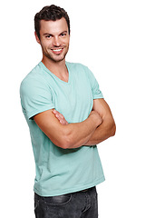 Image showing Man, portrait and happy model with a smile and arms crossed with isolated white background. Calm, happiness and vertical casual positive person with tshirt in a studio with mock up standing alone