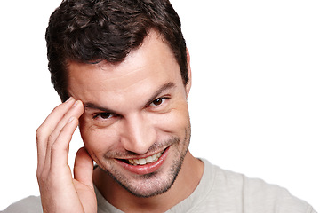 Image showing Happy, handsome and portrait of a man with a smile, sexy and confident isolated on a white background. Happiness, positive and face of a model smiling with confidence and style on a studio background