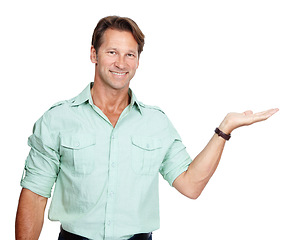 Image showing Business, portrait of man with hand out with smile, product placement and mockup isolated on white background. Marketing, advertising and product announcement or presentation, businessman in studio.