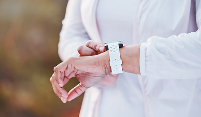 Image showing Smartwatch, woman and hand, heart check with fitness or time, cardio and runner outdoor for exercise. Body training, workout and checking progress, running with wellness and sport motivation mockup