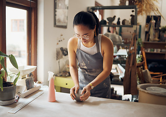 Image showing Design, sculpt and pottery business woman with clay for creativity, inspiration and art process in workshop. Creative, small business and asian girl working at artistic workspace in Tokyo, Japan