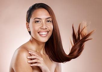 Image showing Face portrait, beauty and hair care of woman in studio on a brown background. Skincare, makeup cosmetics and happy female model satisfied after salon treatment for healthy growth, texture or balayage