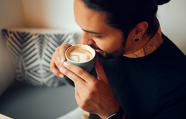 Image showing Man, coffee and hands drinking or smelling aroma of caffeine, mocha or cappuccino relaxing at home. Happy male, person or guy holding a hot or warm beverage in calming relaxation at the house