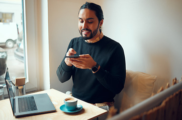 Image showing Creative businessman, laptop and speaker phone for communication, social media or networking at cafe. Happy employee male with smile holding smartphone for voice call or startup at the coffee shop