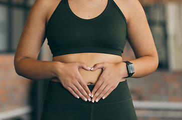 Image showing Closeup, woman and touch stomach, fitness and healthy lifestyle with diet, workout and body care. Female person, lady and feel tummy for wellness, digestion and motivation for slimming and exercise