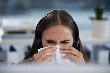 Image showing Sick, tissue and call center woman employee working and blowing nose at a telemarketing job. Customer support, b2b sales worker and contact us business person with virus or allergy at the office