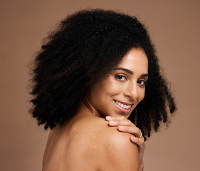 Image showing Happy woman, afro or face skincare on studio background in self love hug, healthcare wellness or body dermatology. Smile portrait, beauty model or natural hairstyle, makeup cosmetic or manicure hands