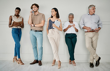 Image showing Hiring, human resources or people in a waiting room for a marketing job interview at a office building. Onboarding, men and business women with career goals wait as a group for company hr manager