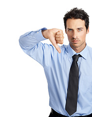 Image showing Hand, thumbs down and portrait of businessman in studio for no, bad and business fail on white background. Face, failure and young entrepreneur showing negative emoji for objection while isolated