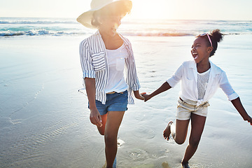 Image showing Mother with girl kids holding hands on beach, happy outdoor and ocean waves, lens flare and fun together in nature. Laughing, black family on summer vacation and adventure, running woman and child