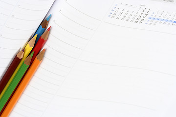 Image showing Color pencil and agenda