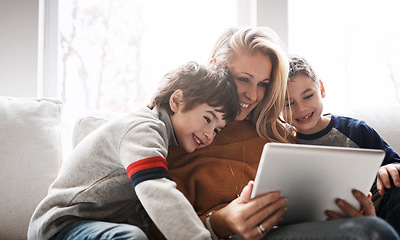 Image showing Relax, tablet and mom with children on sofa bonding, quality time and streaming movies on weekend. Love, family home and mom and kids with digital tech for online games, learning and internet app