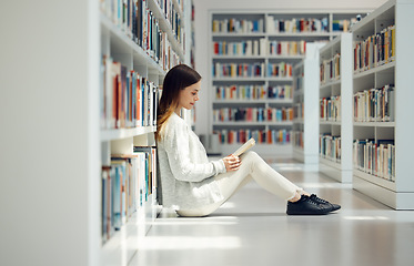 Image showing Reading, knowledge and woman with a library book for education, research and learning at college. Scholarship, academy and student with books for studying information at university on campus