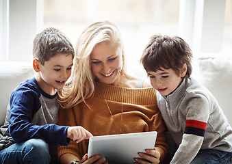 Image showing Family, tablet and mother with children in living room bonding, quality time and relax on weekend. Love, family home and mom and kids with digital tech for online games, learning and social media app