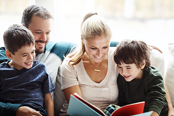 Image showing Mom, dad and kids reading books on sofa for storytelling time with smile in happy family home. Love, learning and couple with children, book and fantasy story on couch, growth and child development.