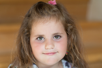 Image showing happy cute little girl with curly golden hair