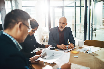 Image showing Corporate, man and leader with team, meeting and brainstorming in office, planning schedule and marketing campaign. Team, manager and staff in workplace, sales growth and teamwork for advertising