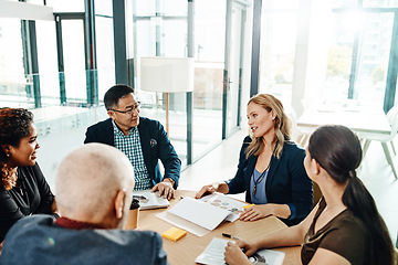 Image showing Innovation, goal and vision of business people in meeting.at corporate workplace together. Collaboration, brainstorming and strategy of interracial employees in company business meeting.