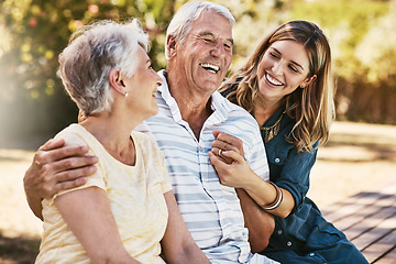 Image showing Woman, grandparents and hug for family summer vacation, holiday or break together in the outdoors. Happy grandma, grandpa and daughter with smile in joyful happiness, love or care for elderly parents