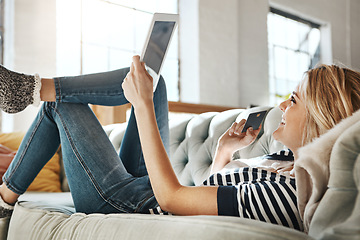 Image showing Woman, tablet and credit card with smile for online shopping, ecommerce or internet banking on living room sofa at home. Female shopper banking on touchscreen with bank card for purchase, app or sale