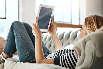 Image showing Woman, tablet and credit card for ecommerce, IOT or online shopping while relaxing on living room sofa at home. Female shopper banking on touchscreen with bank card for purchase, app or sale on couch