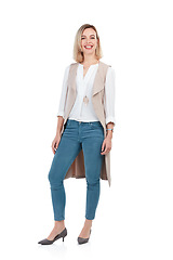 Image showing Studio portrait, woman and smile with fashion for workplace with beauty, style and white background. Isolated executive leader, vision and motivation with clothes, jeans or happiness in design career