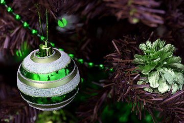 Image showing Christmas ornaments on tree.