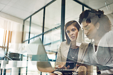 Image showing Business people, laptop and meeting conversation planning tech strategy, online marketing or teamwork collaboration. Corporate women, web design and ux designers talking with digital device in office