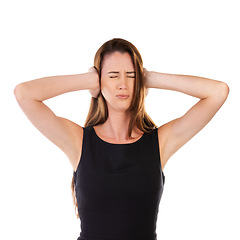 Image showing Woman, covering ears and isolated on a white background standing alone for noise, loud or anxiety. Disturbed female, person or lady with hands on ear and closed eyes to block noisy sounds