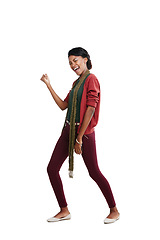 Image showing Success, black woman and celebration for achievement, happiness and girl isolated on white studio background. African American female, lay and movement for motivation, winner and victory on backdrop