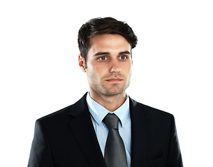 Image showing Face, vision and mockup with a business man in studio isolated on a white background for future growth. Mission, mindset and focus with a male employee looking serious while posing on blank space