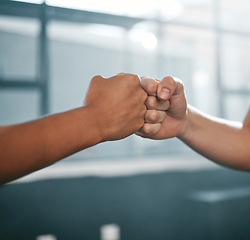 Image showing Hands, fist bump and team fitness motivation for collaboration success, greeting or team building in gym. Athlete hand, exercise partnership deal or support agreement for sports wellness lifestyle