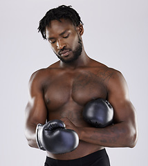 Image showing Fitness, boxing gloves and black man fight for sports training and workout in studio with strong muscle. Athlete boxer person ready for exercise, performance and mma competition with power and energy