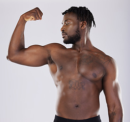 Image showing Black man, fitness and flex muscle for sports training in studio for strong body, biceps and power. Health and wellness of sexy male bodybuilder model with growth motivation after exercise workout