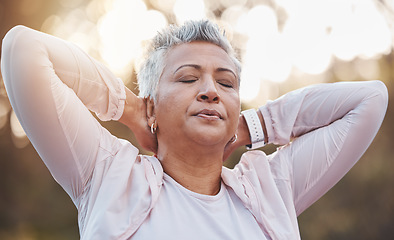 Image showing Senior woman, breathing and stretching arms outdoor for fitness exercise, runner warm up and workout training. Nature forest, elderly athlete and closed eyes for performance, breathe and body stretch