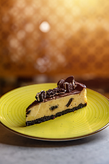 Image showing Tasty cheesecake with chocolate cookies