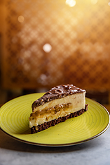 Image showing Caramel cheesecake with chocolate topping