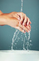 Image showing Woman, water and washing hand zoom isolated on studio background, hygiene and skincare with beauty. Health, wellness and liquid splash, natural cosmetics and body, shower and cleaning hands