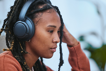 Image showing Music, headphones and black woman thinking of mental health, ideas for staying calm and peace while studying. Student listening to podcast or person audio technology for university stress management