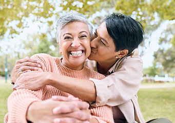 Image showing Couple of friends, portrait or cheek kiss in nature park, grass garden or relax environment in support, love or retirement. Smile, happy or senior women in elderly bonding, fun embrace or trust hug