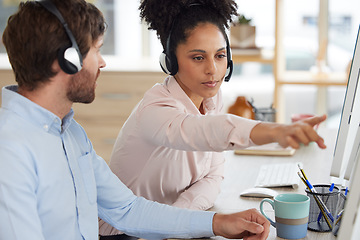 Image showing Call center, customer service and woman pointing, helping and teaching coworker. Telemarketing, customer support and female colleague, sales agent or consultant coaching, assistance and training man.